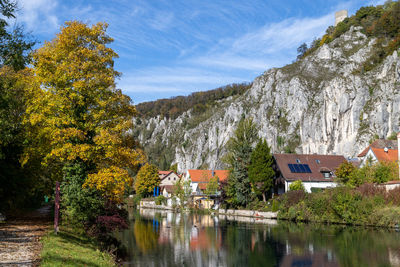 Idyllic view at the village markt essing in bavaria, germany with the altmuehl river and high rocks