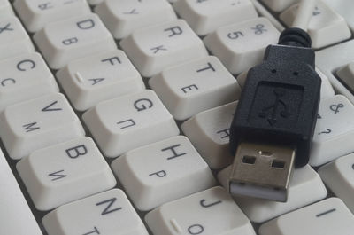 High angle view of usb cable on computer keyboard