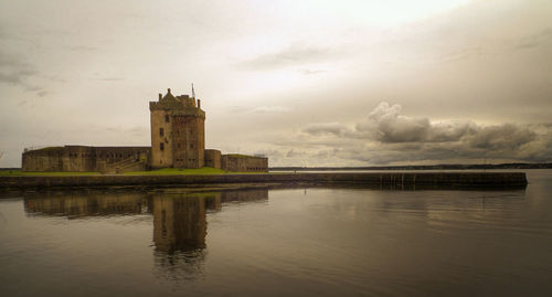View of historical building against cloudy sky