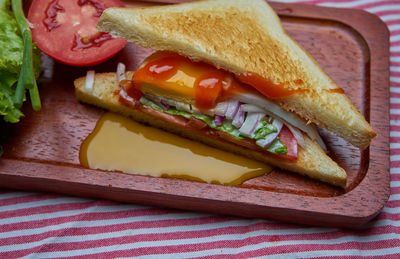 Close-up of breakfast on cutting board