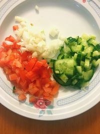 High angle view of chopped vegetables in plate