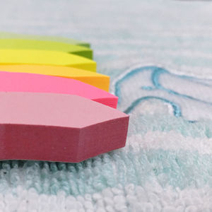 High angle view of multi colored paper on table