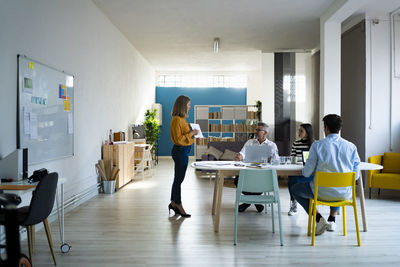 Colleagues doing business meeting in coworking office