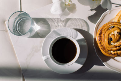 High angle view of coffee cup on table