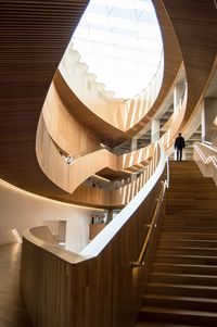 Woman walking on staircase