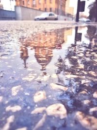 Surface level of puddle on street