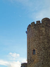 Low angle view of old building against sky