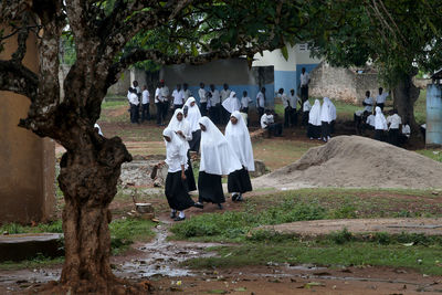 Group of people walking in temple