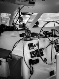 Close-up of steering wheel in sailboat