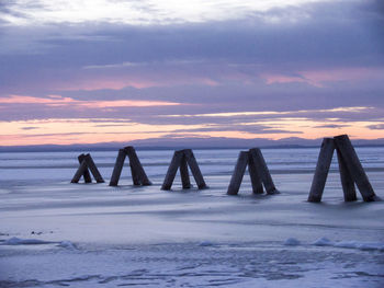 Scenic view of sea at sunset