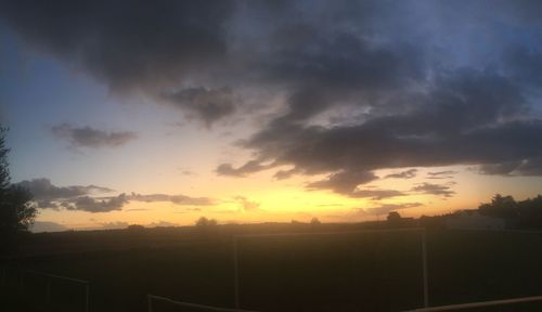 Scenic view of silhouette landscape against sky during sunset