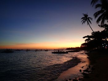 Scenic view of sea at sunset