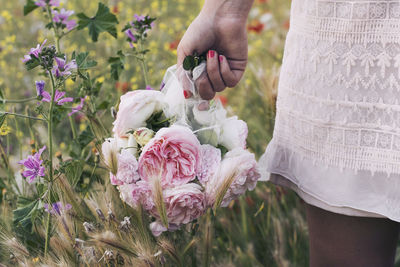 Woman holding a bridal bouquet