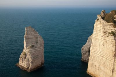 Scenic view of sea against blue sky