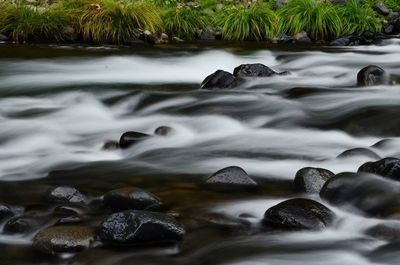 Stream flowing through rocks