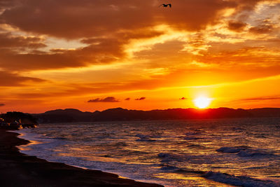 Scenic view of sea against sky during sunset