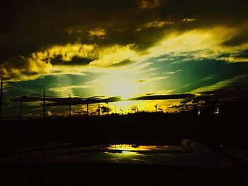 Scenic view of dramatic sky during sunset