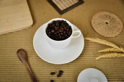 High angle view of coffee beans on table