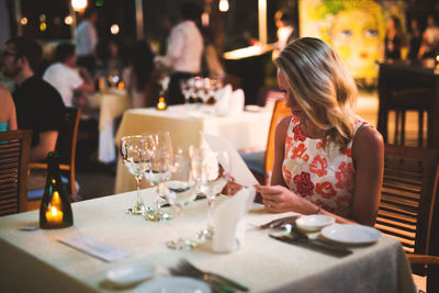 Woman having food in restaurant