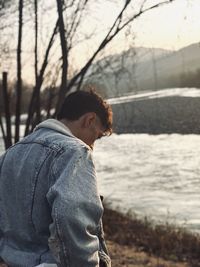 Side view of young man looking away