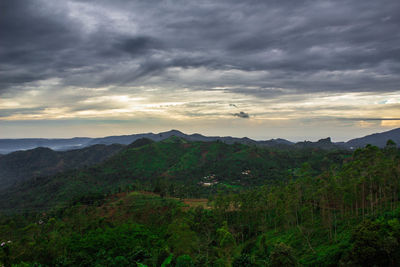 Scenic view of mountains against sky during sunset