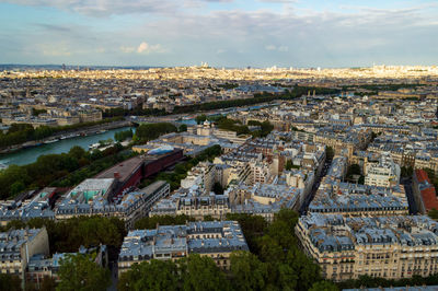 Aerial city landscape of paris, lots of roofs characteristic roofs and chimney