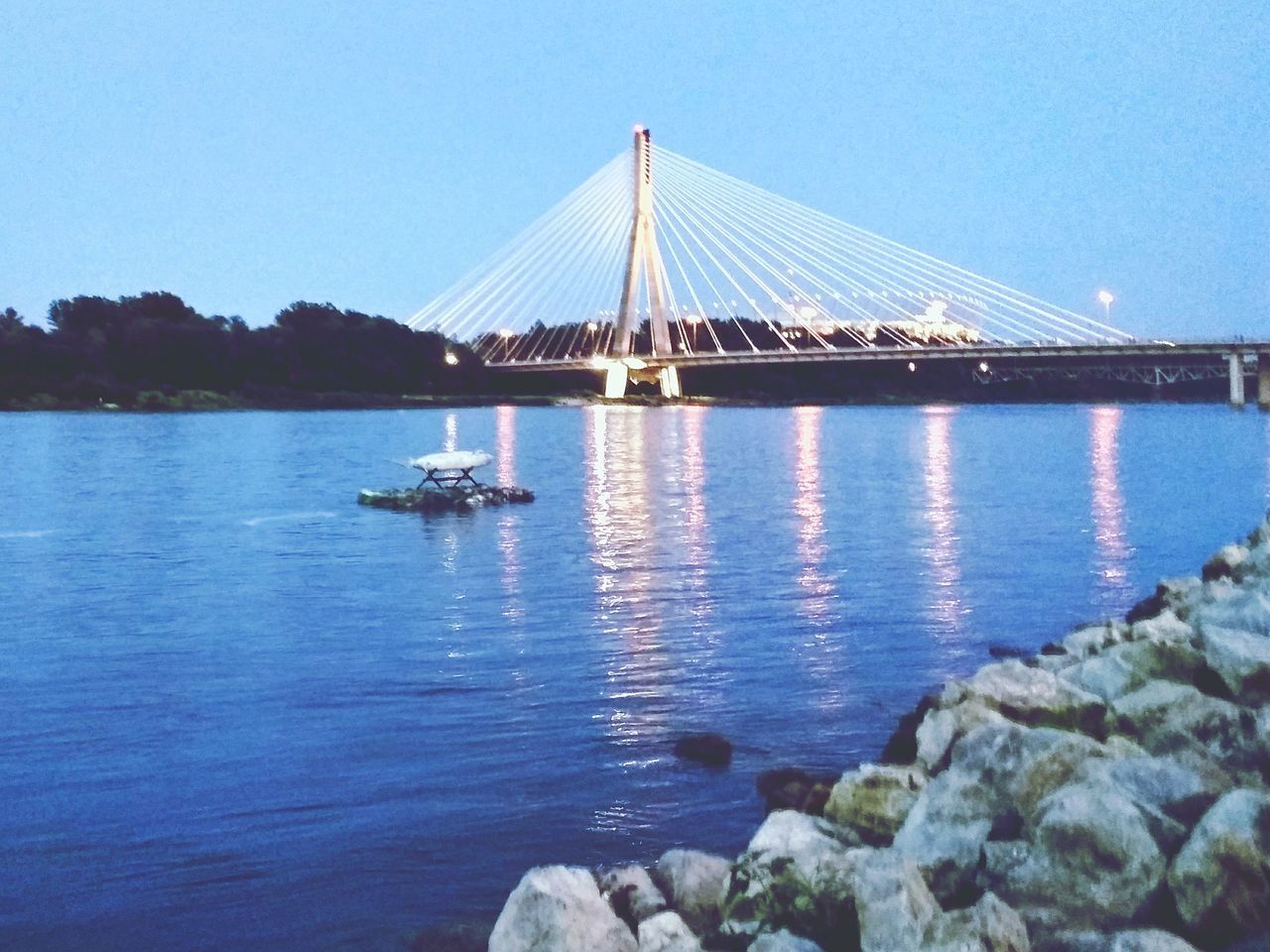 SCENIC VIEW OF RIVER AGAINST BLUE SKY