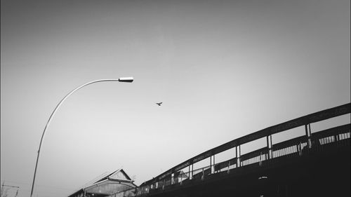 Low angle view of street light against sky