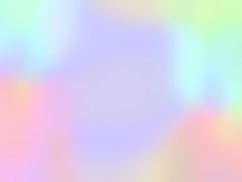 Defocused image of illuminated pink background