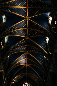 Low angle view of illuminated ceiling