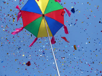 Low angle view of colorful umbrella