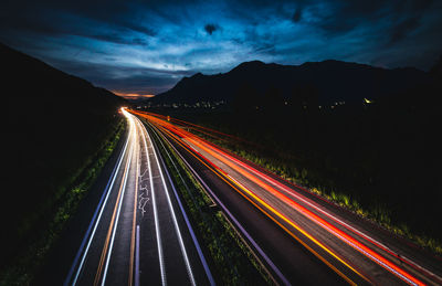 Light trails on road at night