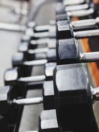 High angle view of dumbbells in gym