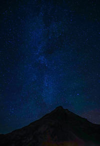 Low angle view of star field against sky at night