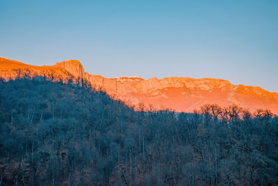 Scenic view of mountains against clear sky