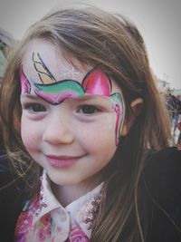 Close-up portrait of a smiling girl