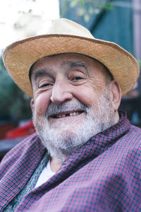 Smiling elderly man with missing tooth