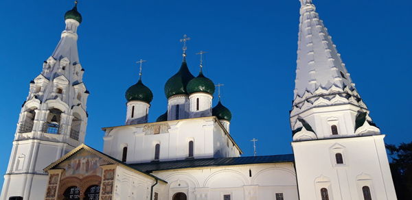 Low angle view of building against blue sky