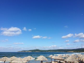 Scenic view of sea against blue sky