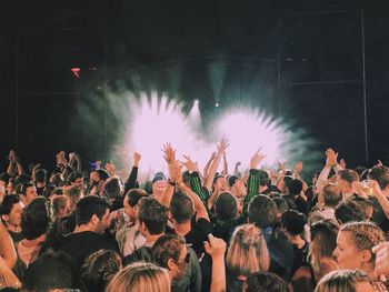 People enjoying in concert at night