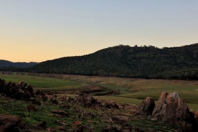 Scenic view of landscape against sky during sunset