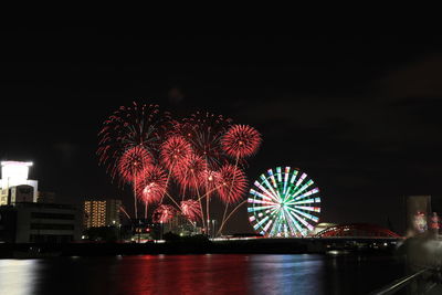 Firework display at night