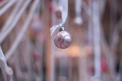 Close-up of christmas bauble hanging outdoors