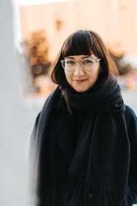 Portrait of young woman in snow