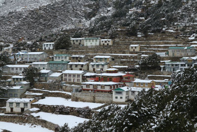 Houses in city during winter