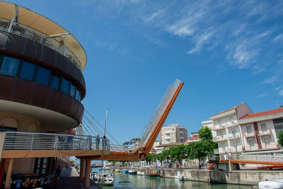 Buildings in city against sky