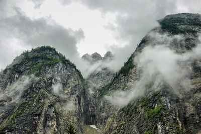 Low angle view of mountains against sky