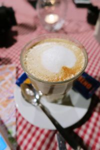 High angle view of cappuccino on table
