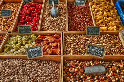 Various dried fruits for sale at market stall