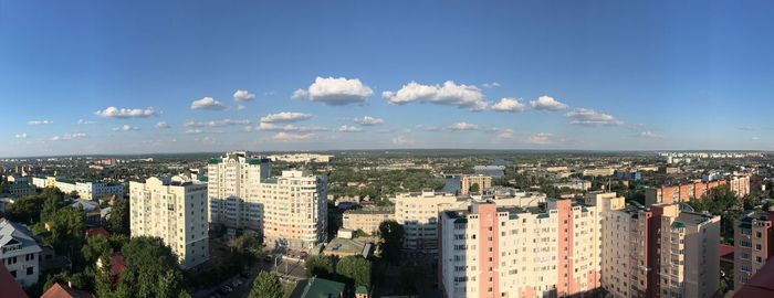 High angle view of buildings in city against sky